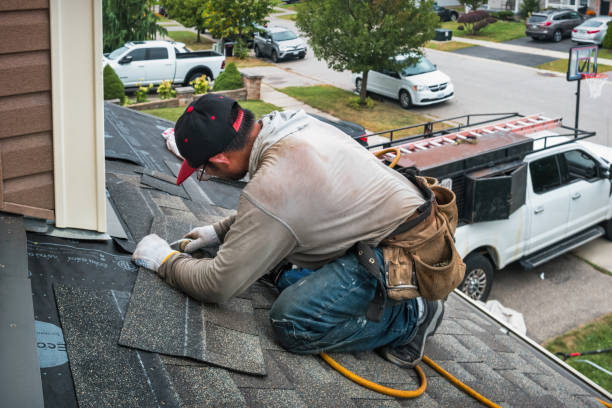 Professional Roofing technician working in Bryantville, MA